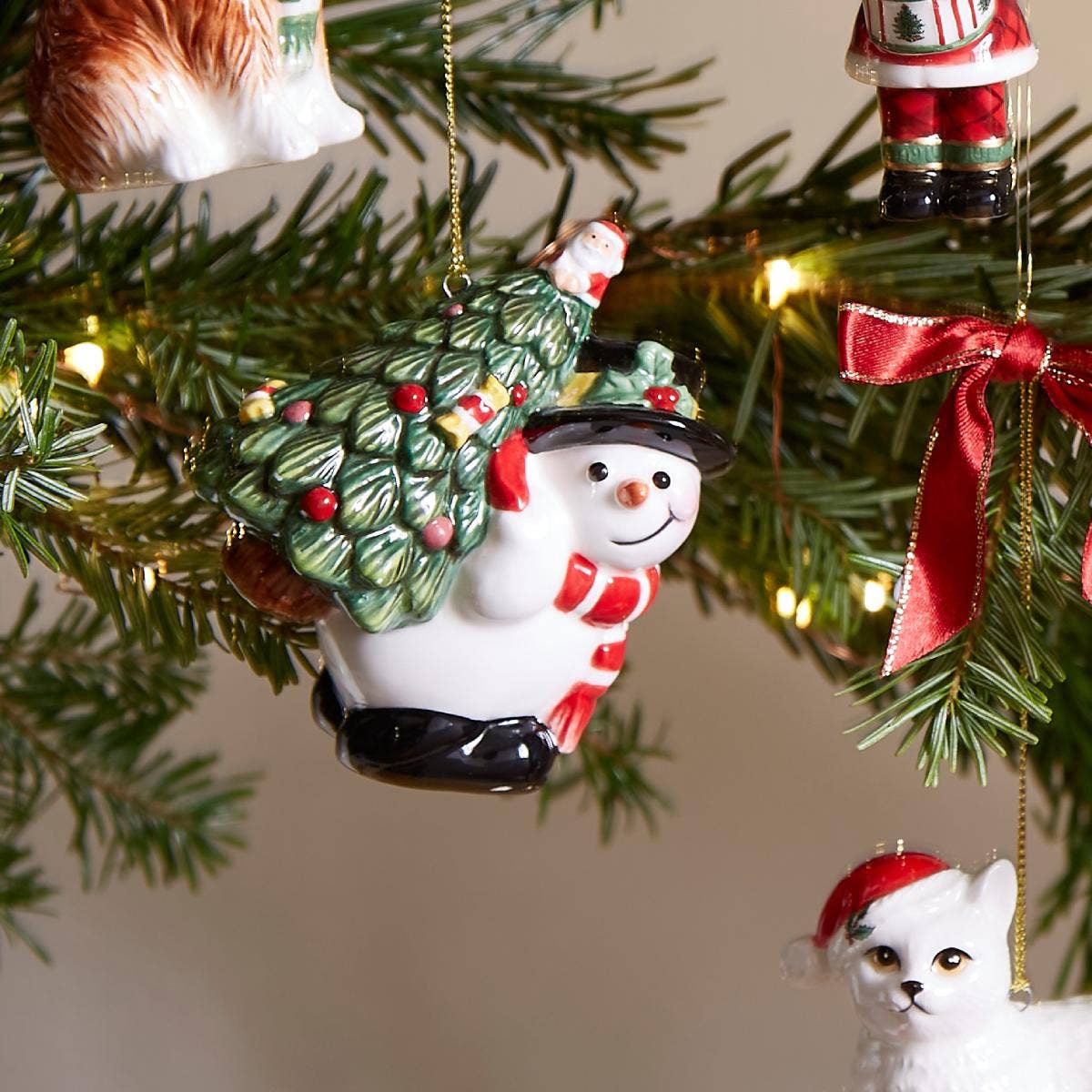 Christmas Tree Snowman carrying Tree Ornament